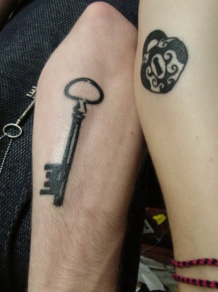 lock and key tattoos. A lock and key on two