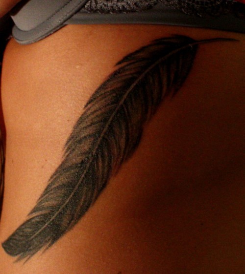 feather tattoo. feather done by lucky#39;s tattoo