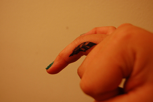 New tattoo A quill on my right ring finger Done by Lorin Hay at Fuzion Ink
