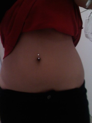 Oh I got my belly button pierced today btw. Bad pic- still at work.
