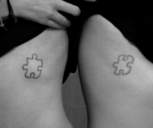 puzzle piece tattoos. got matching puzzle pieces