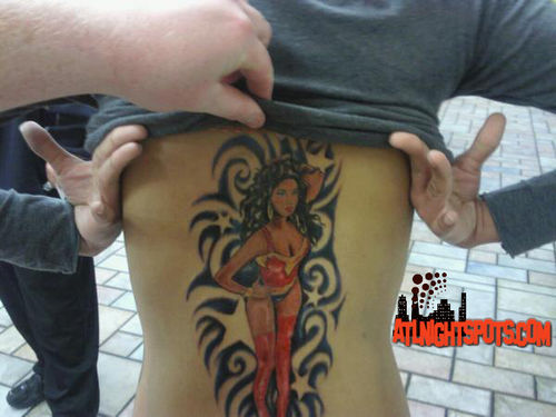 Obsessed Fan Gets Tattoo of Nicki Minaj on Her Back. This is insane.