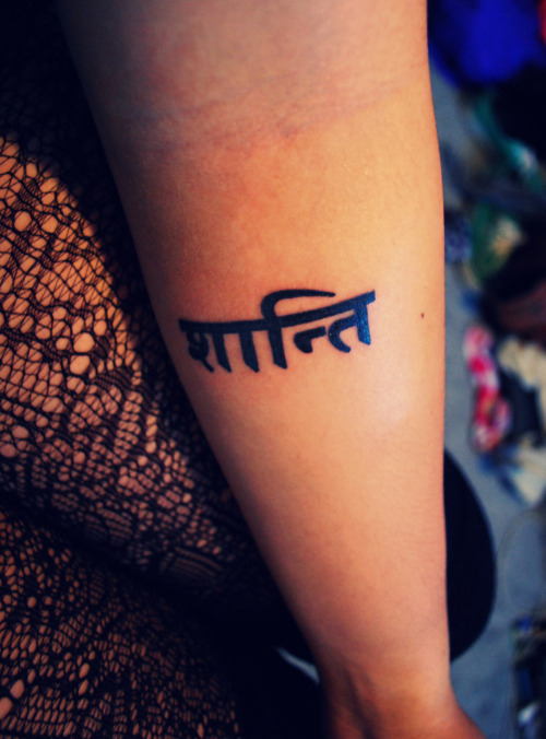 first tattoo. it means peace in hindi. peace because thats what we should 