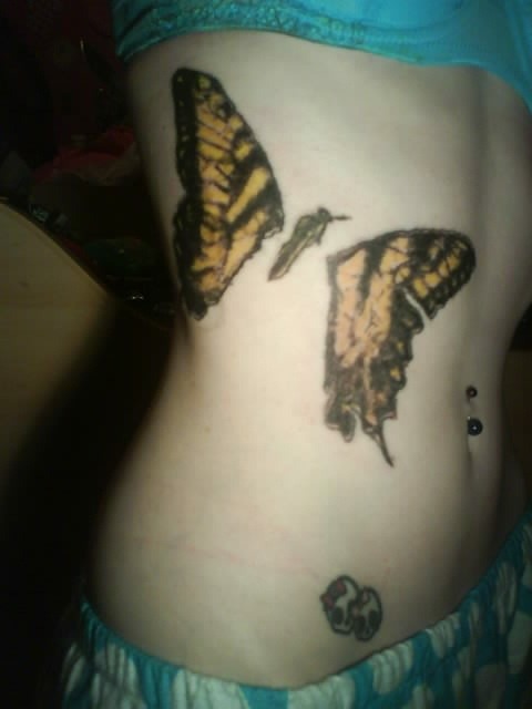 brand new eyes butterfly tattoo.