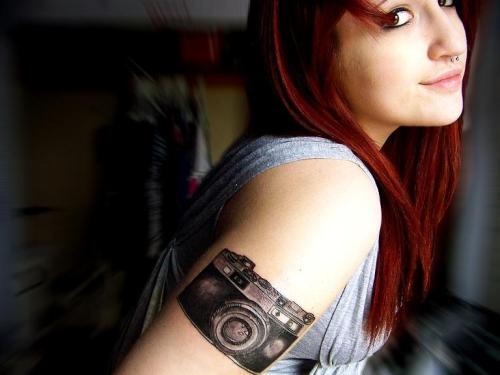 That tattoo is of my very first film camera that my grandpa gave to me when 