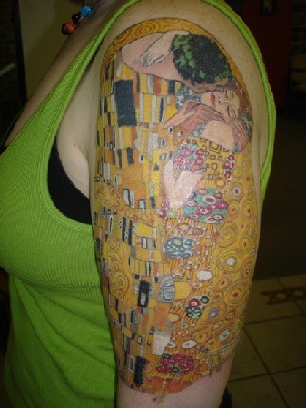 Half arm sleeve tattoo based off of the painting The Kiss by Klimt.