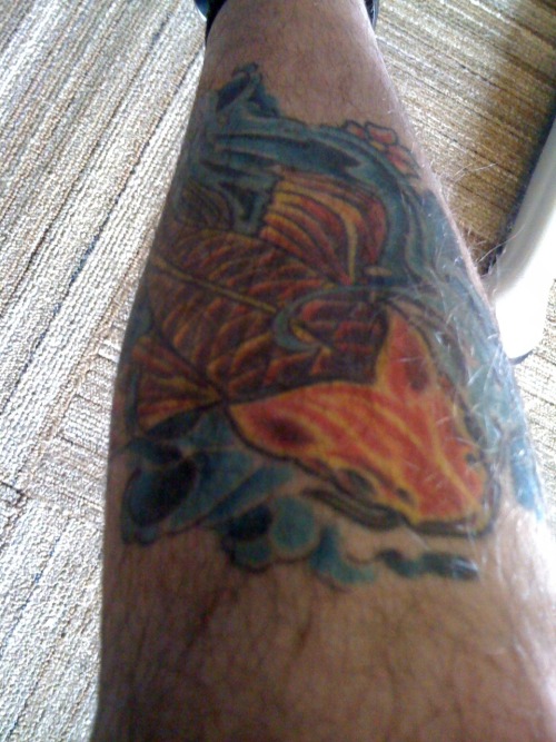 koi fish tattoo on my right leg.