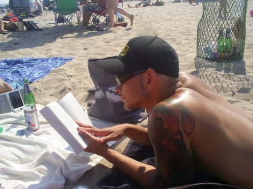 This incredibly hot tattooed guy is a CUNY English professor