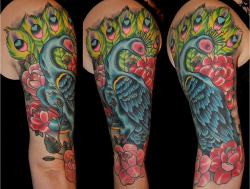 fuckyeahtattoos: I fucking love peacock tattoos. Especially the large-scale 
