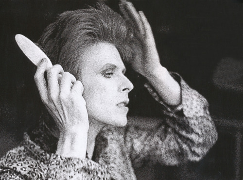 Byron Newman - [David Bowie, backstage, unknown South London venue, late 1972]

from Any Day Now: David Bowie The London Years (1947-1974)