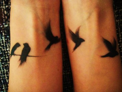 My first tattoo. It is one swallow for each and every one in my family.
