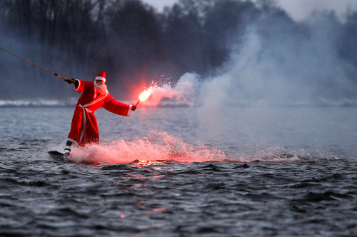 Santa wakeboarding with flare