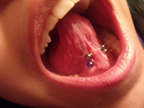 My frenulum (tongue web) piercing. done by myself.