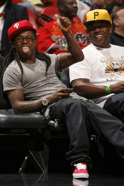 Phillies Hat + Red Vans. Weezy knows how it is!