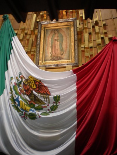 virgen de guadalupe with mexican flag. Virgen de Guadalupe (Nahuatl: