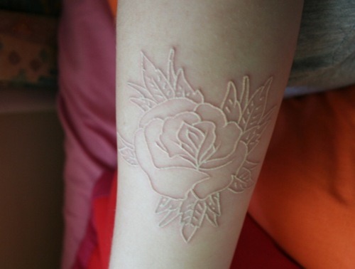 as rose white ink tattoo