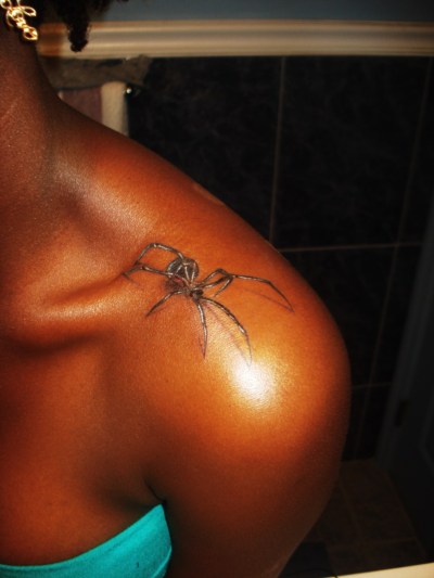 black widow spider tattoo. aka a lack widow spider,