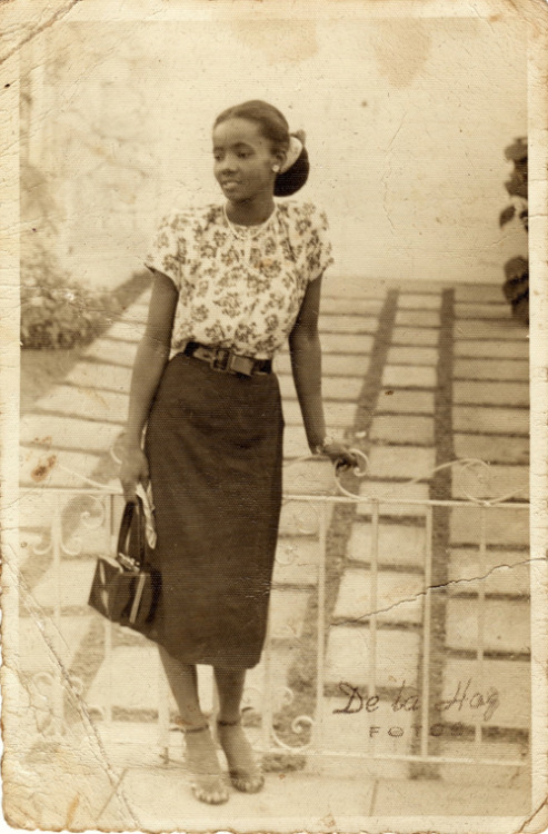 
#daintii
Valeria Perojo Frias, born in Pinar del Rio, Cuba in 1926. Photo circa 1940s.
Via The Sartorialist:
This is my beautiful mother, Valeria Perojo Frias, born in Pinar del Rio, Cuba on March 23, 1926. This photograph was taken sometime in the mid to late 1940’s. I believe she was at a christening of a friend’s child in Havana. She was an amazing and inspirational woman - making her way to the US with my father by way of Miami in late 1959, and ending up in New York City two years later, where I was born and raised. She was always a fashionista and had that amazing aura that exuded beauty, charm and grace. And boy could she pose for a picture, eh? She always will be my very own personal style icon.
