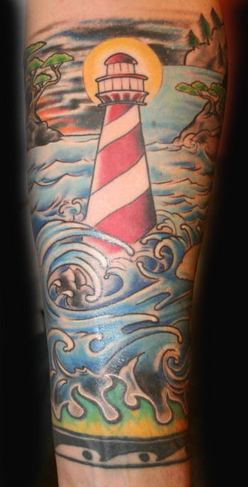 Lighthouse tattoo done by Raul Tanguma Sailor's Tattoos in Wichita KS