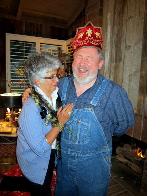 Janis Foster brought lovely gifts for us all. Leslie received a lovely lace Mantilla and Paul this velvet crown. In my mind he shall forever be known as &#8220;Popie.&#8221; As you see they were happy recipients.
I behave better in front of Popie now that he has that magic hat.