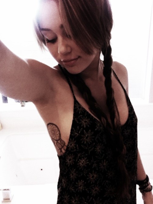 miley cyrus tattoo dreamcatcher. In this photo: miley cyrus