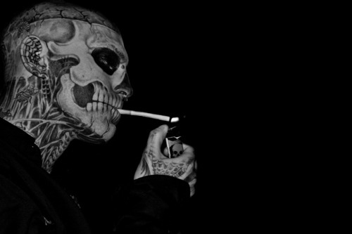  skeleton skull tattoo tattooed man tattoos cigarettes smoking