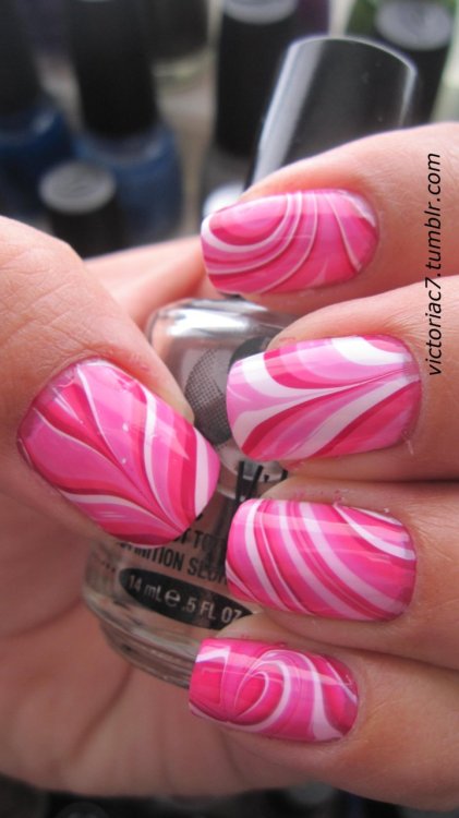 victoriac7:  Various shades of pink in this water marble.  I like the pattern on the thumb.