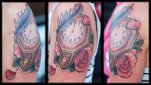 And one of many other tattoo's It's my grandpa's clock that I was always