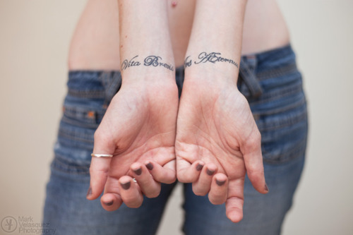 Erin's tattoos which read Vita Brevis Ars Aeternus Latin for Life is 