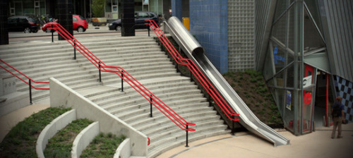 kenyatta:

Dutch Railway Installs a Slide To Get To The Train

It’s officially called a ‘transfer accelerator’ by Dutch railway maintenance company ProRail, but everyone else would say it’s a slide. An awesome slide. Installed next to a stairway at the newly renovated railway station Overvecht in the city of Utrecht, the slide offers travellers the opportunity to quickly reach the railway tracks when they’re in a hurry. 

Be sure to click through for the video
via The Pop-Up City

i think every set of stairs needs a slide, its like an escalator but fun and it won’t suck your untied shoelaces into it and kill you n___n 
