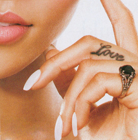 Rihanna's tattoo on her middle finger Love 