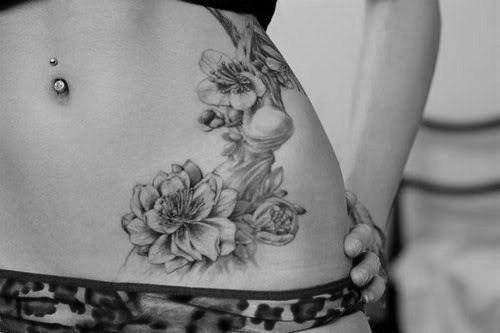 Filed under tattoo hip flowers