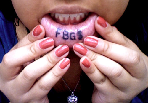 Inner lip tattoo Done by Big