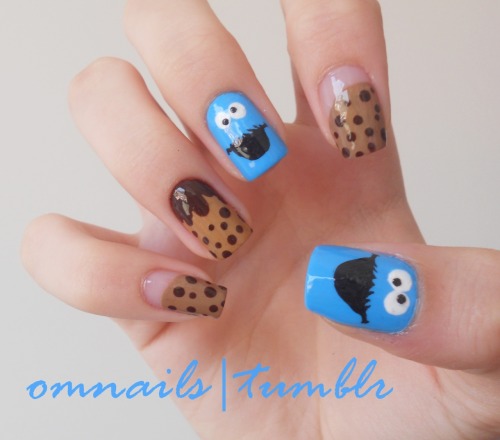 omnails:

Cookie Monster nail art | One of my awesome followers asked for a Cookie Monster nail art and I liked the idea so there it is! Hope you cookie lovers like it!!! xoxo

