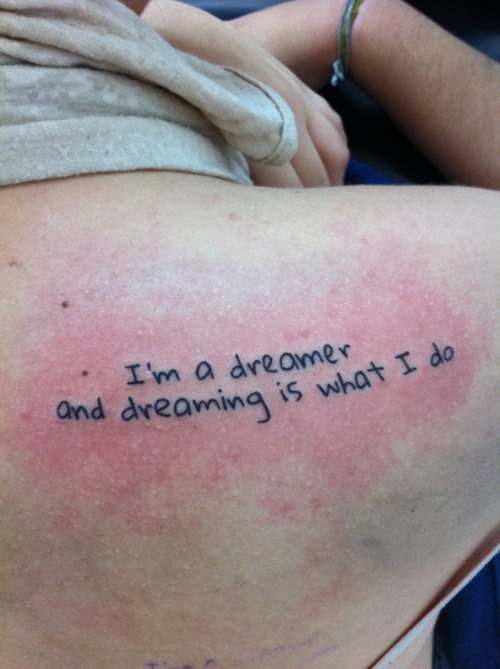 this tattoo quotes McFly's song Sorry's not good enough You're a dreamer