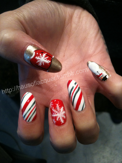 hausoflacquer:

Christmas nails complete with ugly Christmas sweaters, snowmen and snowflakes…

