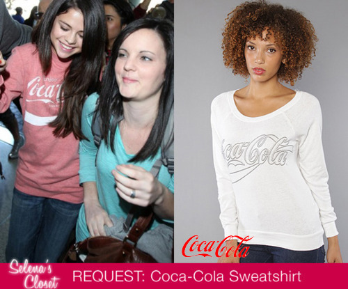 Normally we try to stay away from posting stuff that&#8217;s not exact but this is a hot item (meaning it got A TON of requests). We couldn&#8217;t find the actual coca-cola sweatshirt that Selena is wearing so here is the closest alternative.
This is the Coca-Cola Script Fleece. Its on sale for $23.95&#160;on karmaloop.com buy it HERE
Its also on sale for $47.60&#160;HERE
**EDIT** The very awesome transparentskies sent us a tip. Selena&#8217;s Coca-Cola sweatshirt is from Target but its not available: see below for other options

CLICK HERE for info on the above tops. 