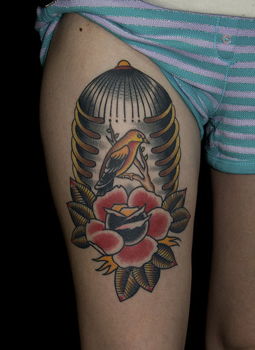 tattoos bird rib cage tattoo