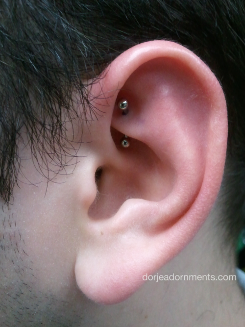 Rook piercing by Nick