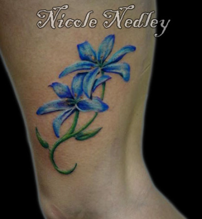 It is located on the side of her upper thigh wwwnicolenedleycom 
