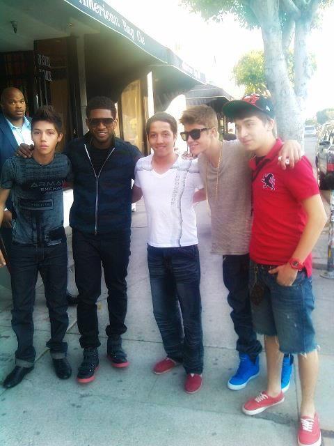 Justin with Usher and fans
