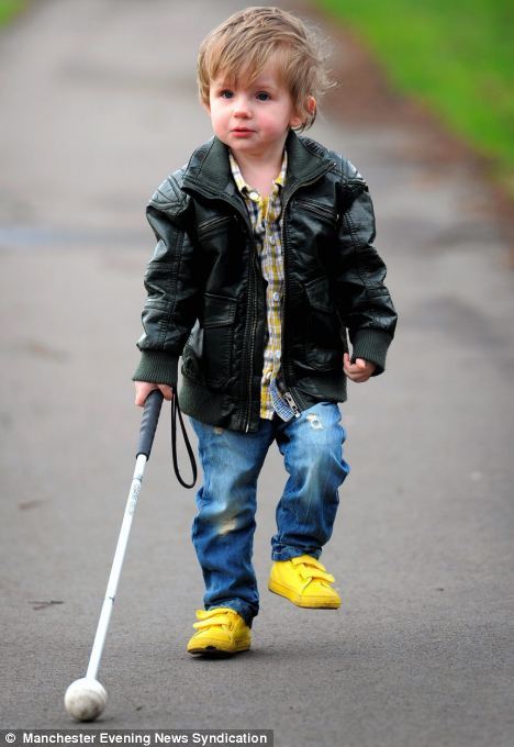 kuchh-khaas: The history of Oscar, the blind boy “When impatient shoppers see little Oscar O’Sullivan-Hughes using his white cane, they assume it is just a toy and tut disapprovingly at him.But two-year-old Oscar was actually left blind at birth due to a rare genetic defect. Now his parents have spoken out to raise awareness of child blindness. Oscar, who lives with parents Kate Hughes and Anthony O’Sullivan in Wythenshawe, Manchester, has Lebers Congenital Amaurosis. Ms Huges, 30, said: ‘Oscar’s used the cane since he’s been able to walk. Often when we are out in the shops he will stop to smell the bread, touch the fridges or smell the shampoos. ’People will lose patience with him and stride right over his cane. They have never knocked him over but they are so insensitive and will tut at him because he is holding them up. ’Often we think it’s because they are not aware or because they see that he is so young and think he can’t possibly be blind.’” full article here aweee baby. 