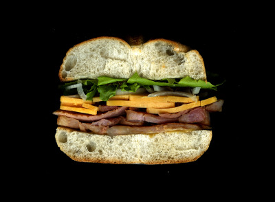 Homemade: Grilled Ham, Cheddar, Onions, Mixed Greens, Honey Mustard, On a Toasted Roll